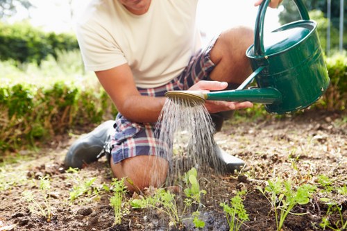 Landscapers Hanwell team with safety equipment and waste removal tools